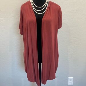 Open front  short sleeved jacket